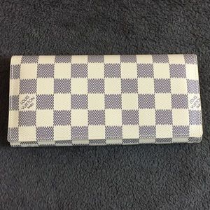 White checkered wallet.